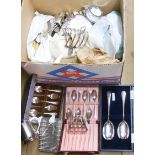 A box containing a large quantity of silver plated items including toast racks, cased and loose