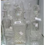Seven assorted decanters including Victorian, Edwardian, and later examples
