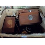 A box containing two small cased theodolites, a small copper powder flask, pewter, lidded pot, etc.