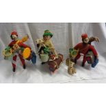 Three vintage Spanish Roldan cloth dolls comprising two bellboys with luggage and pets, and a lady