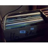 A box of LP records including James Last, Harry Lauder, etc.