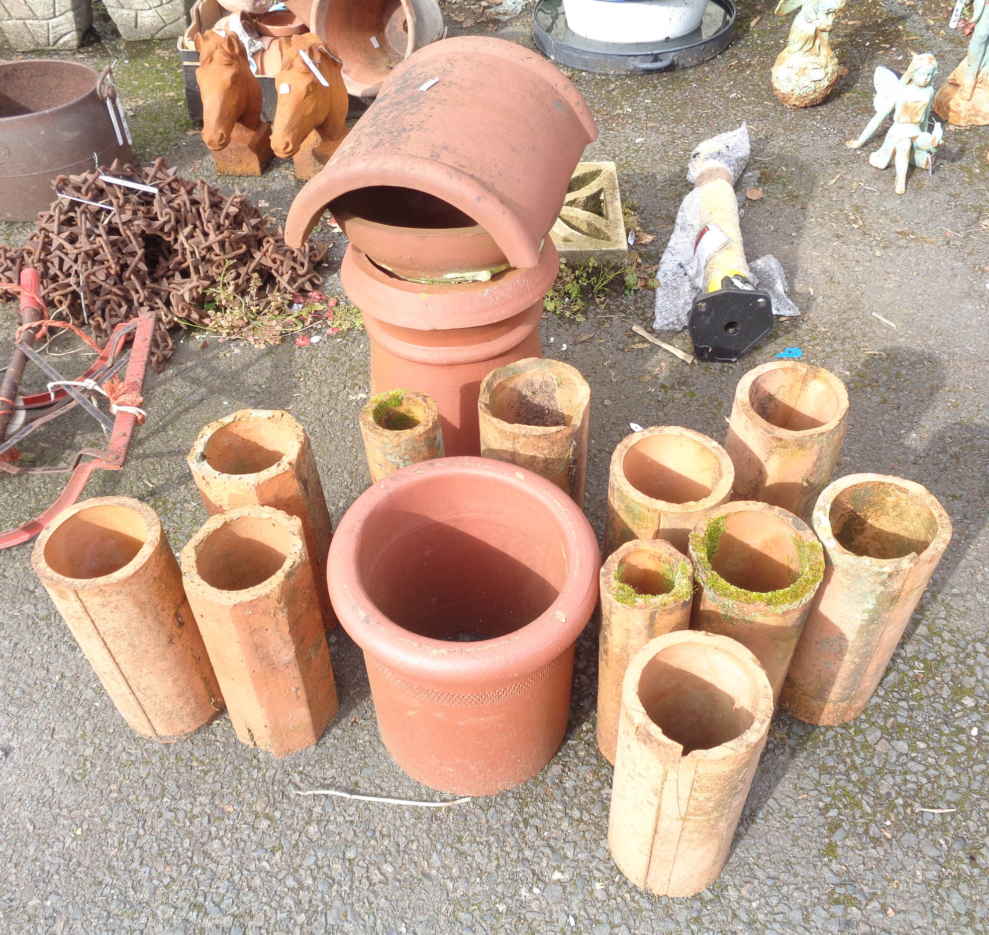 Two chimneys and eleven terracotta pipe sections