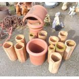 Two chimneys and eleven terracotta pipe sections