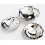 A pair of small silver pedestal bon-bon dishes - sold with a larger similar