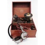 A cased GPO No. 226 crystal radio set by A.W. Gamage Ltd. with headphones - some damage