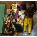 A box containing a collection of mainly world costume dolls