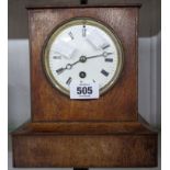 A late 19th Century oak cased mantel timepiece with eight day movement
