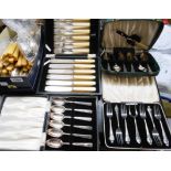 A quantity of cased and loose silver plated cutlery including a grapefruit set, etc.