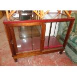 A 3' 10 1/2" vintage oak and glazed shop display cabinet with later stained top beading, pair of