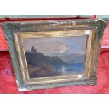 A 19th Century gilt gesso framed oil on board depicting a classical mountain lake scene by moonlight