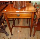 A 21" Edwardian mahogany side table with frieze drawer, set on square tapered supports with spade