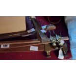 Three vintage brass beam trammels, with walnut beams, an antique beech panel gauge - sold with two