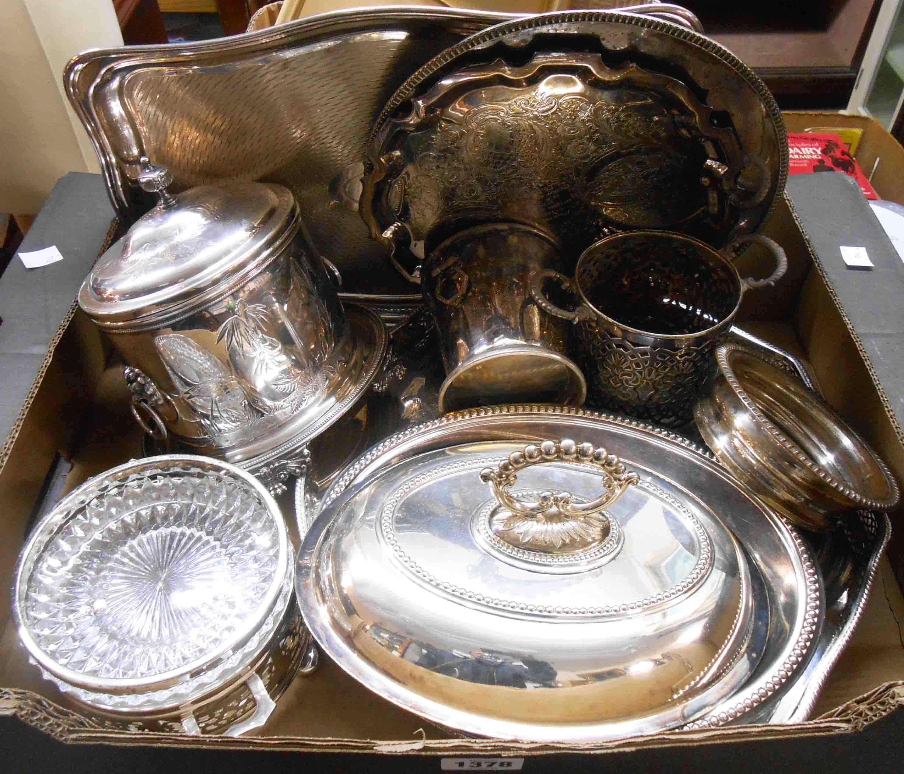 A quantity of silver plated items including gallery tray, ornate biscuit barrel, coasters, entree