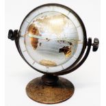 A vintage Estyma brass framed novelty bi-hemisphere desk timepiece with flip-over convex dial,