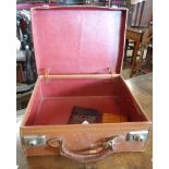 A small leather suitcase - sold with two faux crocodile skin items