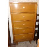 A 1950`s "Staverton" golden oak and mixed wood filing cabinet with five bracket locking up-and-