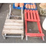 A wooden sledge and another similar - one a/f
