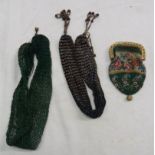 A Victorian embroidered beadwork purse - sold with two similar misers purses - various condition