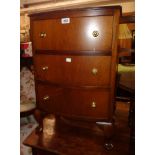 An 18" reproduction mahogany and mixed wood bow front bedside chest of three long drawers, set on