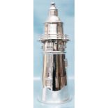 A 14" silver plated novelty cocktail shaker in the form of a lighthouse