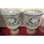 A pair of Nippon porcelain urn pattern vases with moriage decoration - various condition