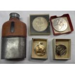 A hip flask, assorted commemorative coins, etc.