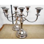 A pair of Ianthe silver plated three branch candelabra with detachable nozzles