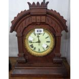 A late 19th Century stained wood cased American shelf clock with Ansonia spring driven gong striking