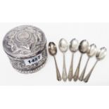 A 3 1/2" diameter Victorian silver box with stylised armorial to push-fit lid and embossed foliate
