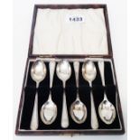 A cased set of six silver teaspoons with bright-cut style decoration