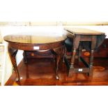 A 22 1/2" modern polished joint stool style drop-leaf occasional table - sold with a 24" diameter