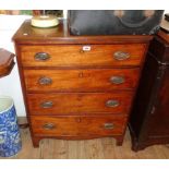 A 29 1/2" 19th Century mahogany chest of four long graduated drawers, set on bracket feet
