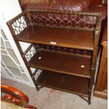 A 25 1/2" stained cane and wood three shelf open bookcase