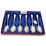 A set of six Victorian silver teaspoons with bright cut style decoration and lion armorial to