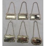 Five silver plated decanter labels