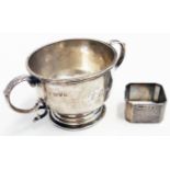 A Chester silver two handled footed trophy bowl bearing initials - sold with a silver napkin ring