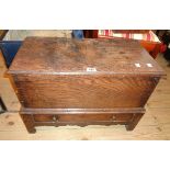 A 25" 18th Century oak coffer with long drawer under, set on bracket feet