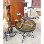 An iron candle stand and one other