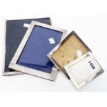 Four silver fronted photograph frames, three with easel backs - various sizes the largest to take 9"