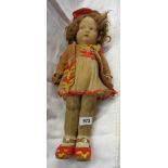 A vintage cloth doll in the Norah Wellings style