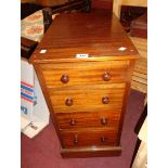 A 14 1/2" Victorian mahogany four drawer pedestal chest with later top, set on plinth base