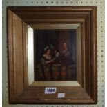 An antique gilt framed and slipped oil on panel depicting an interior scene with male musician,