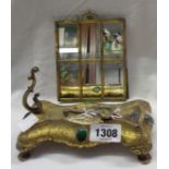 A 19th Century brass swing six section picture frame with base decorated with acanthus scrolls and