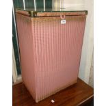 A 1955 Lloyd Loom linen basket with glass top and original painted finish