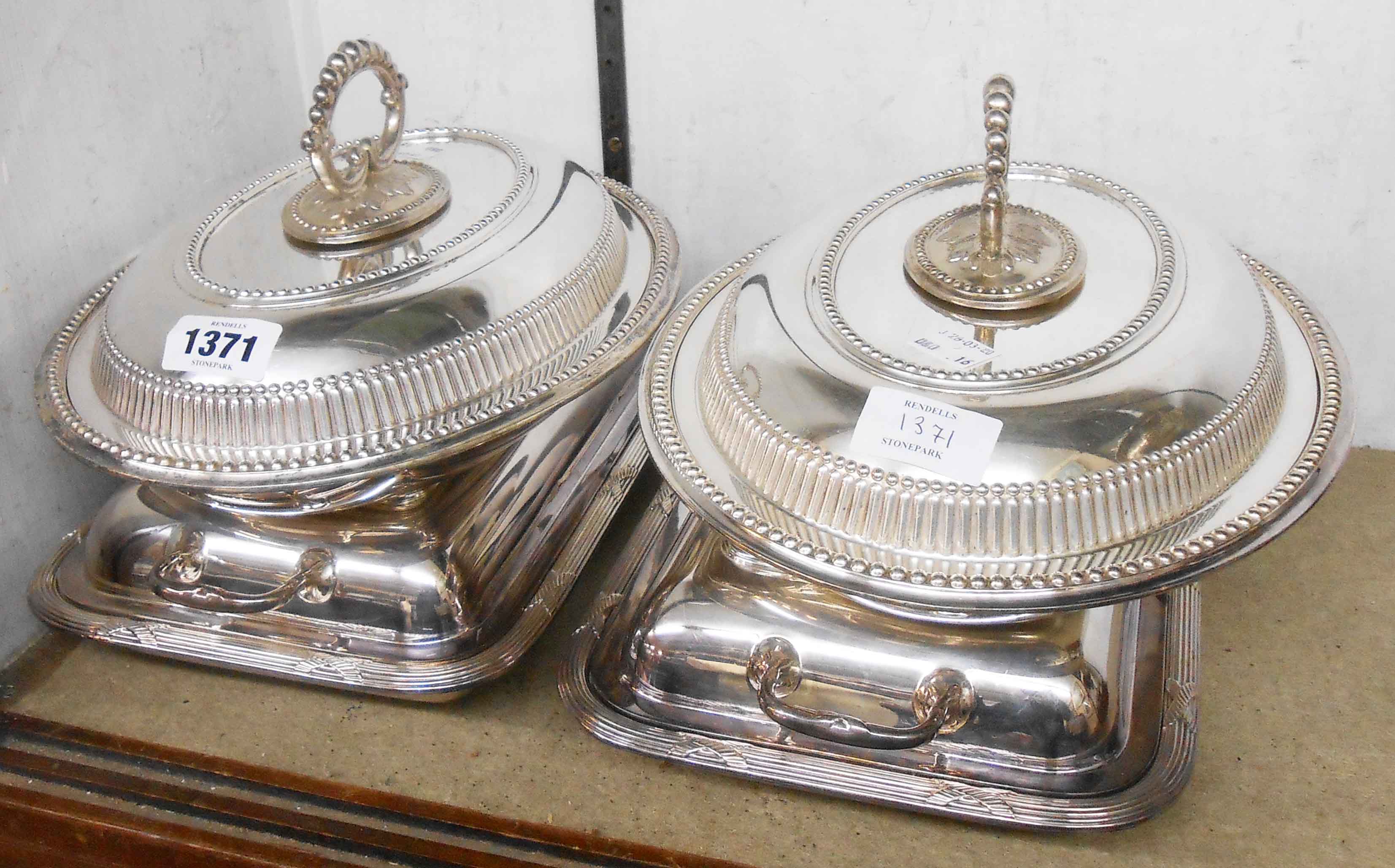 Two pairs of silver plated entree dishes comprising beaded oval with detachable handles and oblong