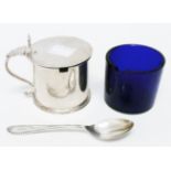 A Victorian silver flip-top mustard pot with blue glass liner and associated spoon - London 1852
