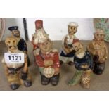 Seven Tremar Pottery figurines including butcher, carpenter, and fisherman