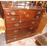 A 4' Victorian mahogany chest with central deep drawer and four flanking short drawers over three