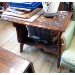 A 30" late Victorian polished oak occasional table with decorative floral scroll carved decoration