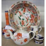 A large Japanese porcelain dish, small Chinese teapot, and an onion vase - sold with two continental